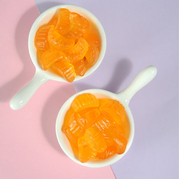 El sabor anaranjado embroma los dulces gomosos formados fruta gomosa del vegano Halal de las vitaminas